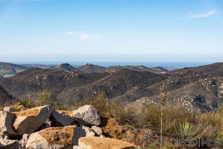 Meadow Glen Way, Unit 56 Escondido, CA 92026 - Photo 4 of 8 an aerial view of a house with lots of trees