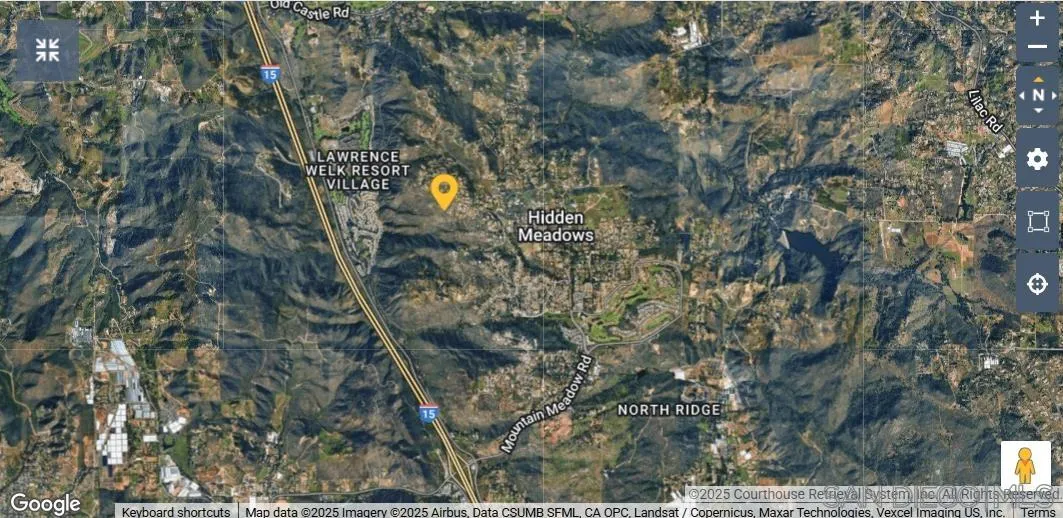 Meadow Glen Way, Unit 56 Escondido, CA 92026 - Photo 7 of 8 a view of a yard with large trees