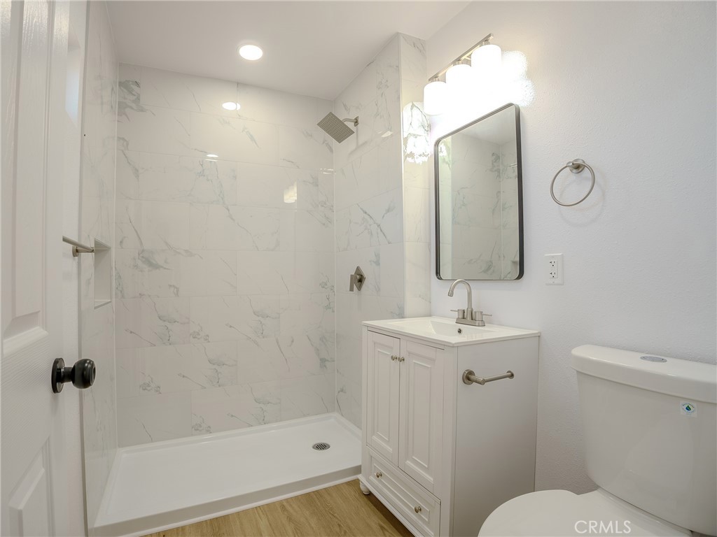 21865 Fox Apple Valley, CA 92307 - Photo 12 of 27 a bathroom with a sink a toilet and shower