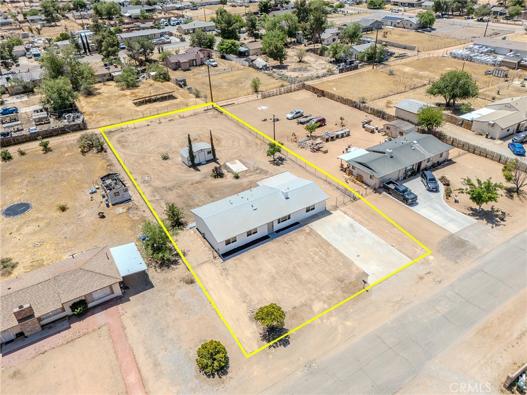 21865 Fox Apple Valley, CA 92307 - Photo 2 of 27 an aerial view of a house with a swimming pool