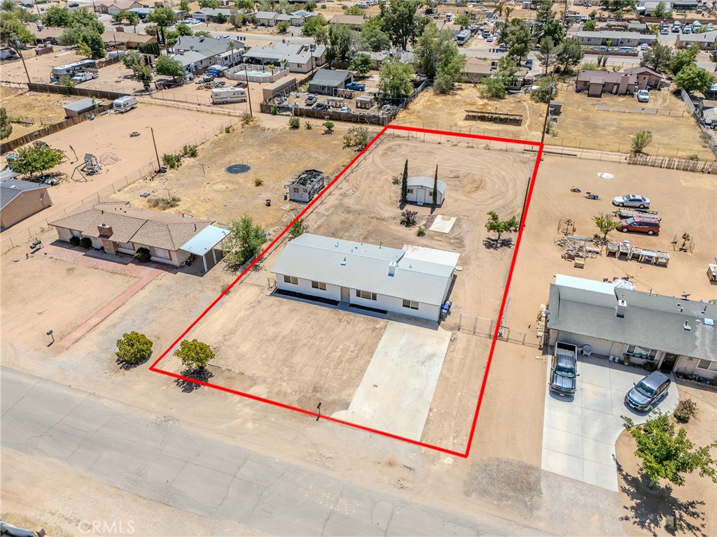 21865 Fox Apple Valley, CA 92307 - Photo 24 of 27 an aerial view of a house with a yard and seating area