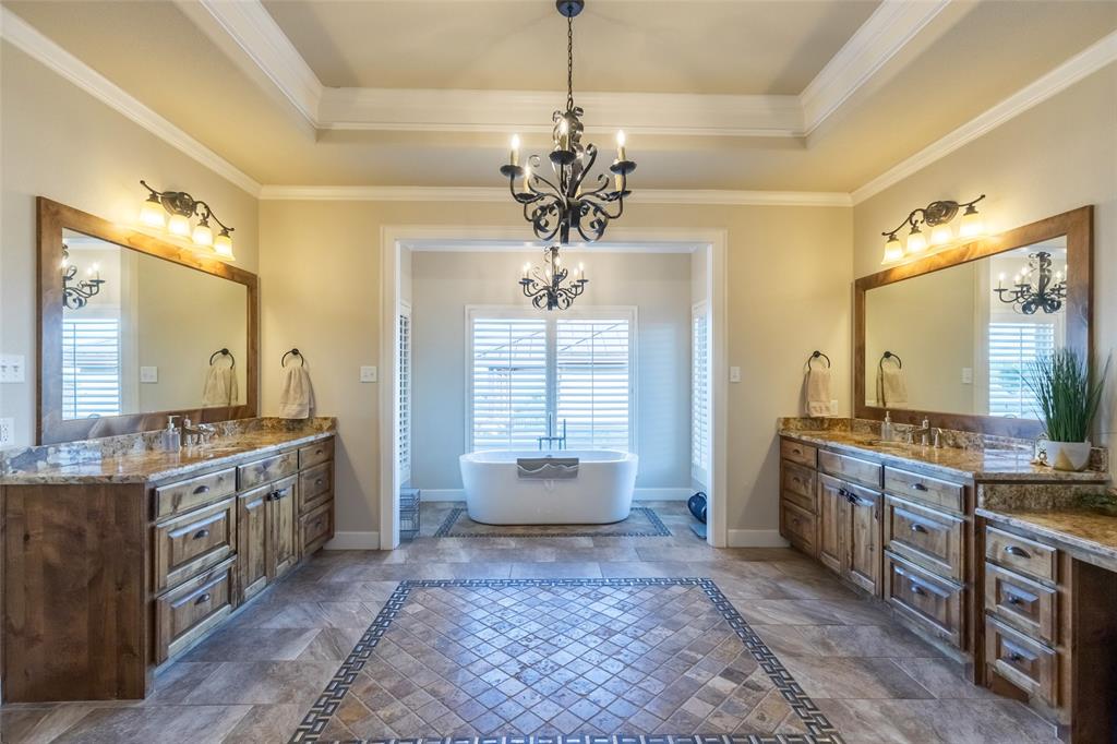 126 Phoenix Lane Tuscola, TX 79562 - Photo 24 of 40 a kitchen with kitchen island granite countertop a stove and cabinets