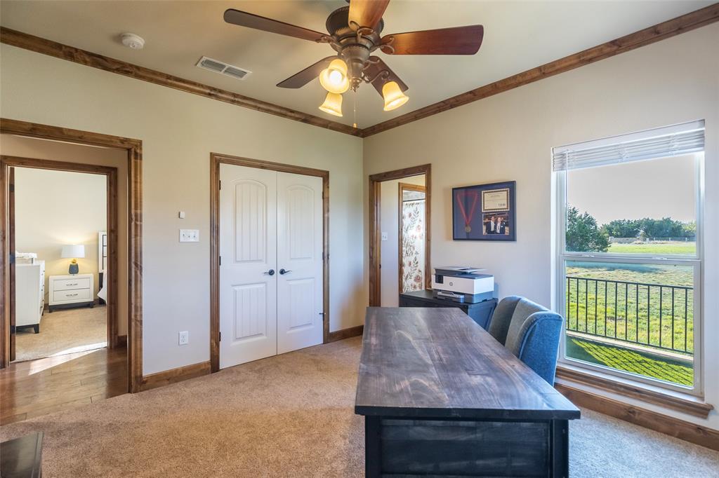 126 Phoenix Lane Tuscola, TX 79562 - Photo 33 of 40 a view of a livingroom with furniture and a chandelier