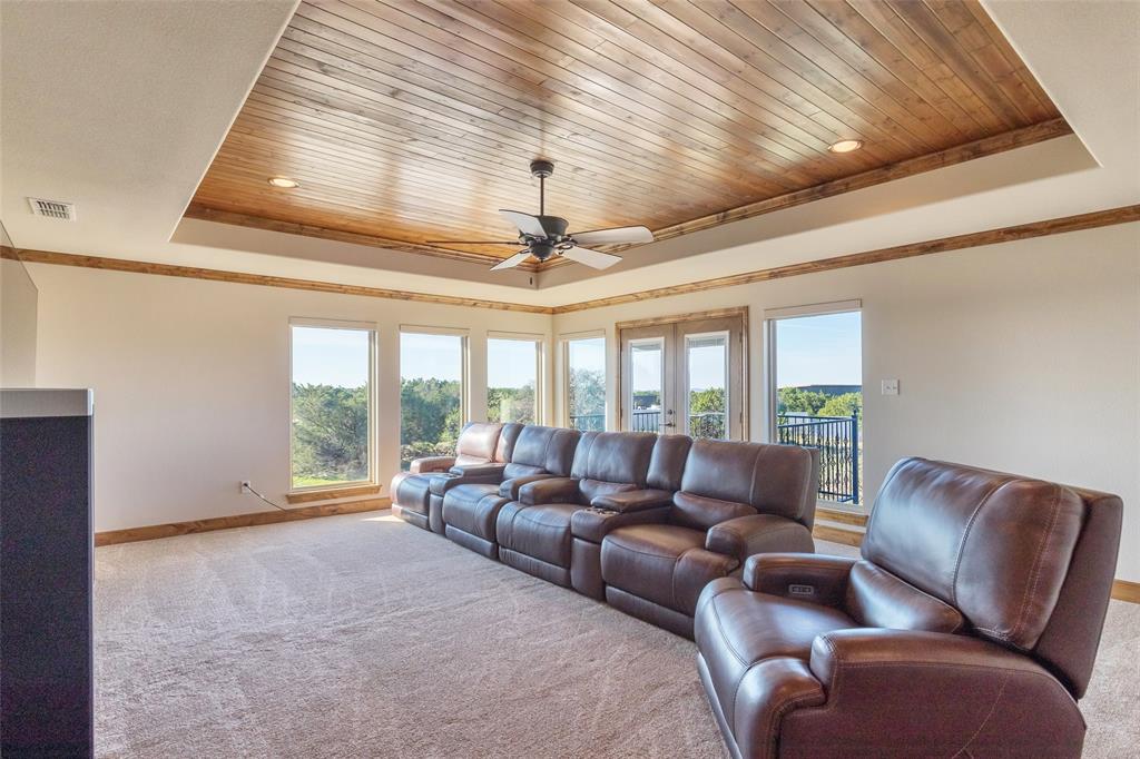 126 Phoenix Lane Tuscola, TX 79562 - Photo 36 of 40 a living room with furniture and a large window