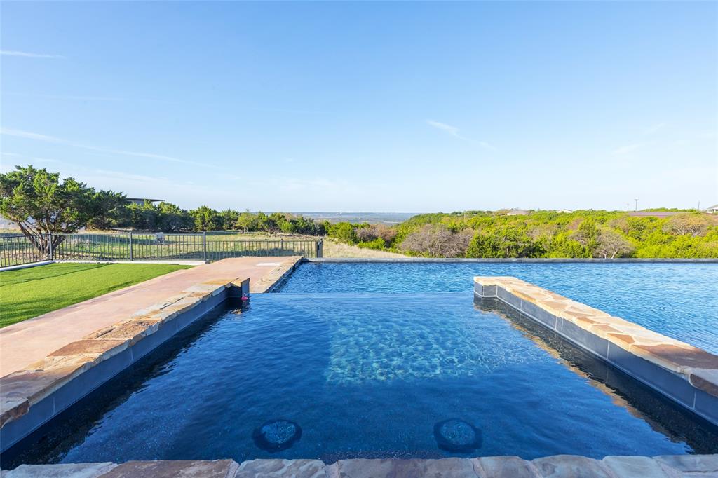 126 Phoenix Lane Tuscola, TX 79562 - Photo 4 of 40 a view of swimming pool with outdoor space and seating area