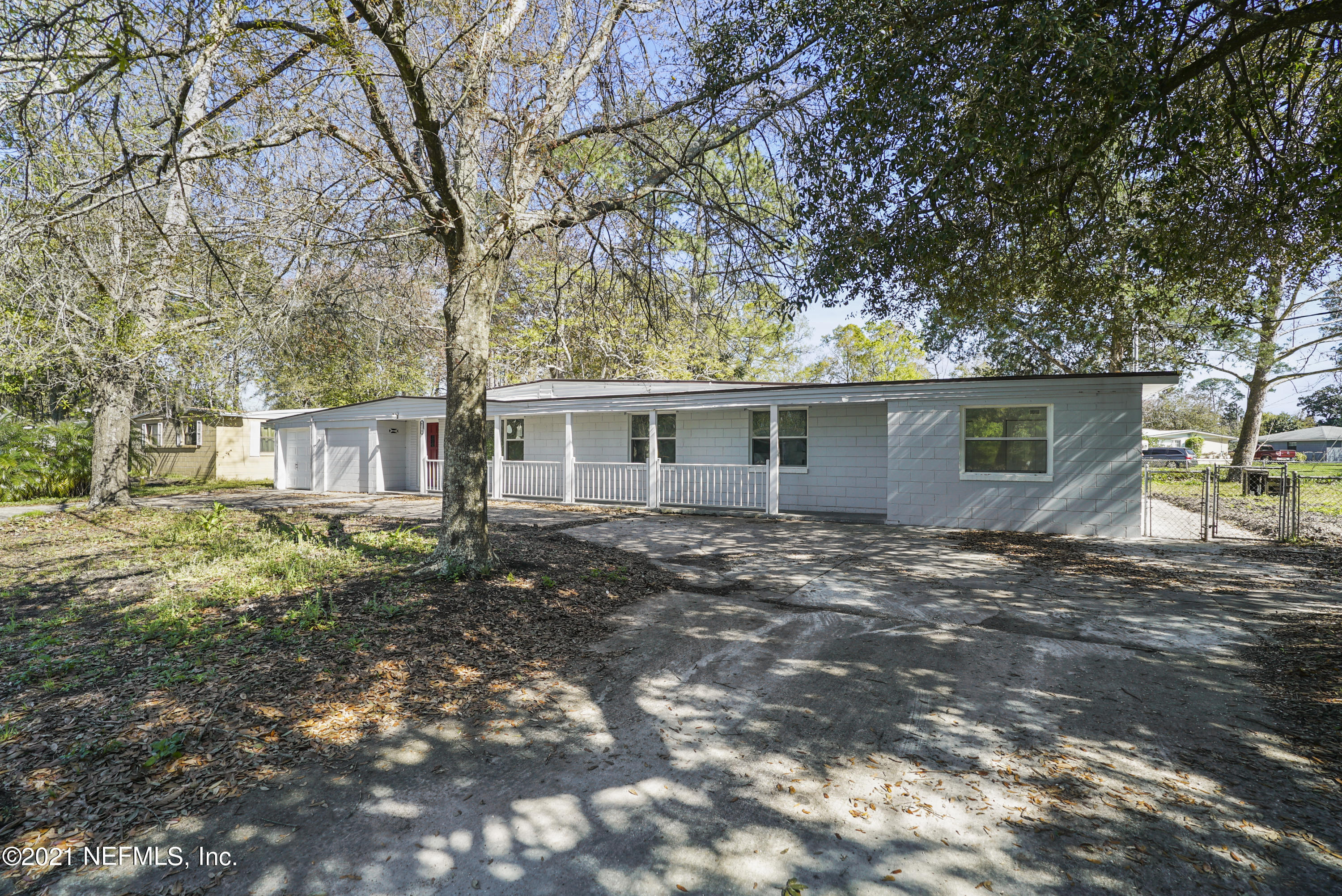 4175 Spring Glen Road Jacksonville, FL 32207 - Photo 22 of 25 a view of a house with a yard