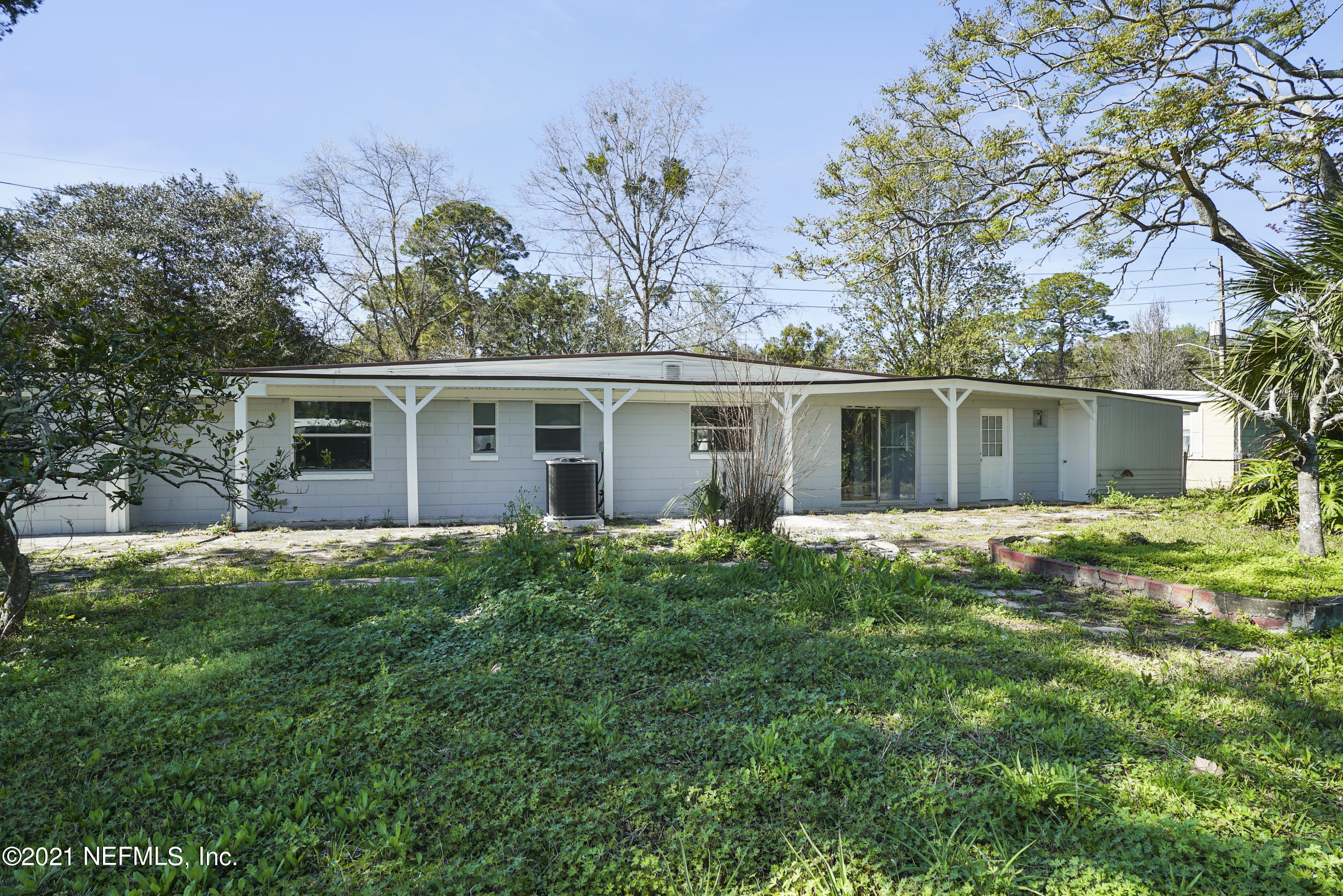 4175 Spring Glen Road Jacksonville, FL 32207 - Photo 24 of 25 front view of a house with a yard