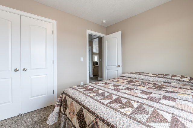 1228 North Providence Way Tooele, UT 84074 - Photo 19 of 28 Soft beige wall paint and plush carpet flooring