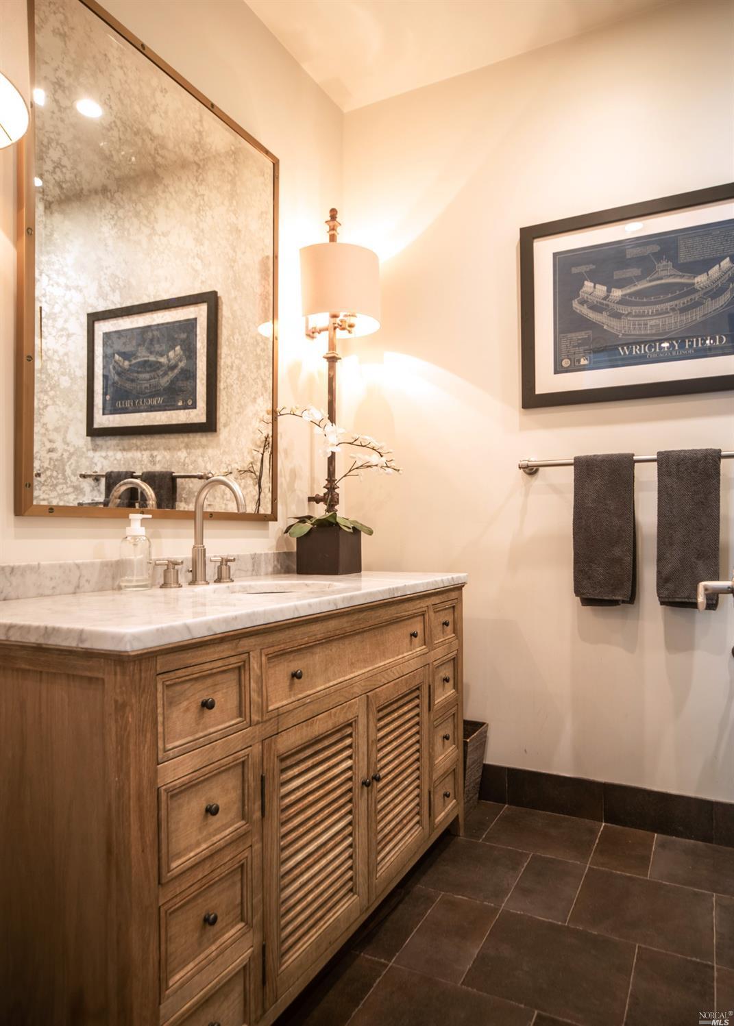 208 Reed Boulevard Mill Valley, CA 94941 - Photo 22 of 47 The downstairs full bathroom with stand up shower, also serves as a powder bath for guests.