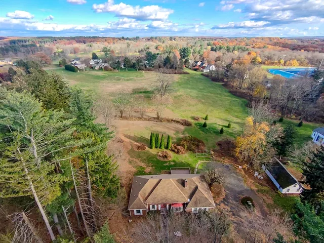 an aerial view of lake residential house with outdoor space