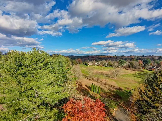 a view of a yard with an outdoor space