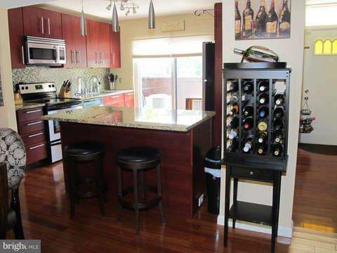9237 Three Oaks Drive Silver Spring, MD 20901 - Photo 11 of 30 Kitchen with Breakfast BarGranite Counters