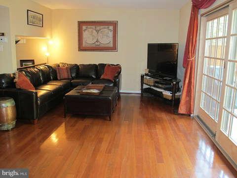 9237 Three Oaks Drive Silver Spring, MD 20901 - Photo 3 of 30 Living Room with gleaming wood floors
