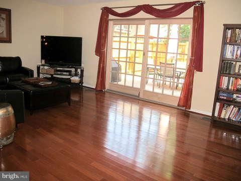 9237 Three Oaks Drive Silver Spring, MD 20901 - Photo 5 of 30 Living Room with new glass doors to patio