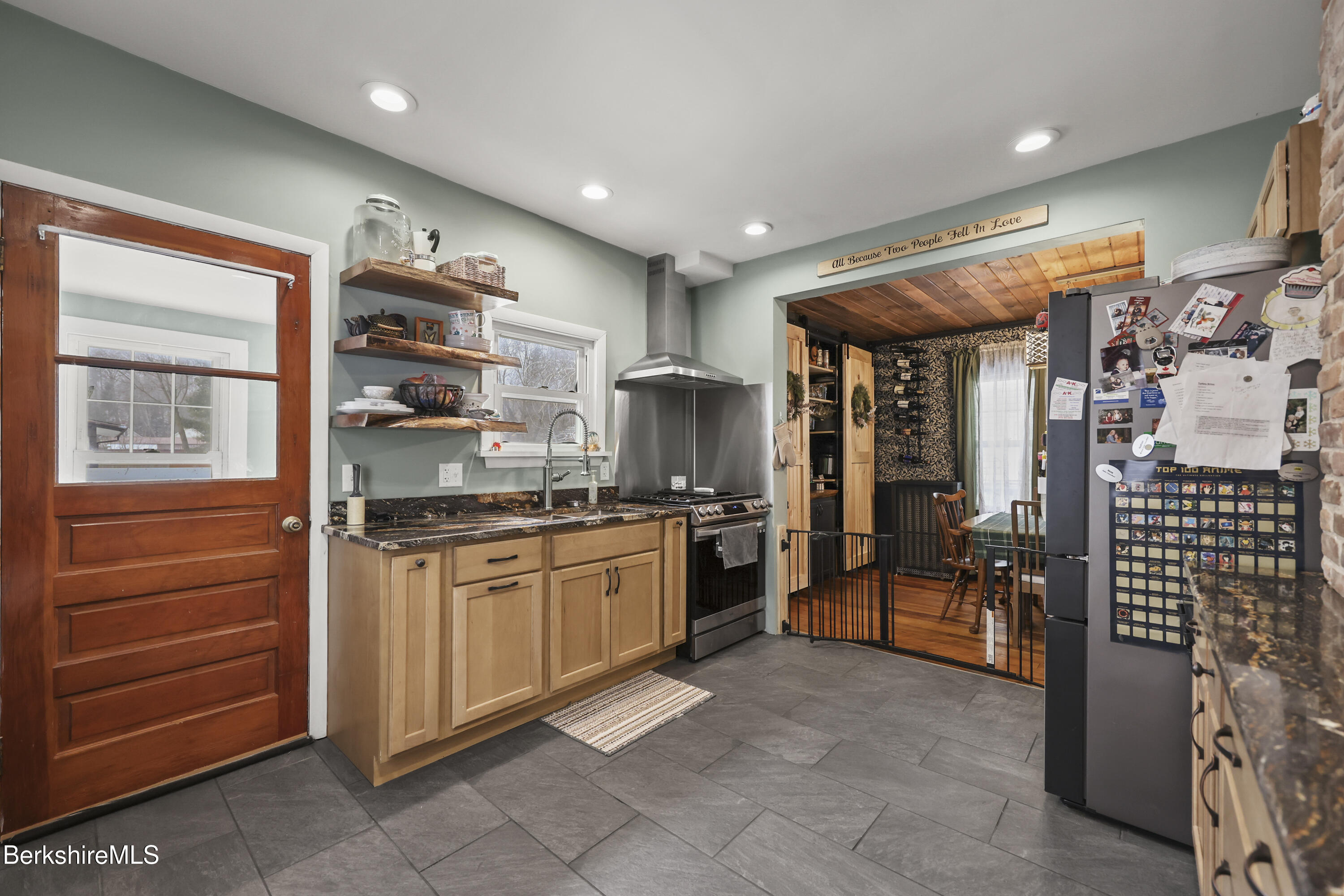 2 Crotteau Street Adams, MA 01220 - Photo 11 of 24 a kitchen with stainless steel appliances granite countertop a refrigerator and a stove