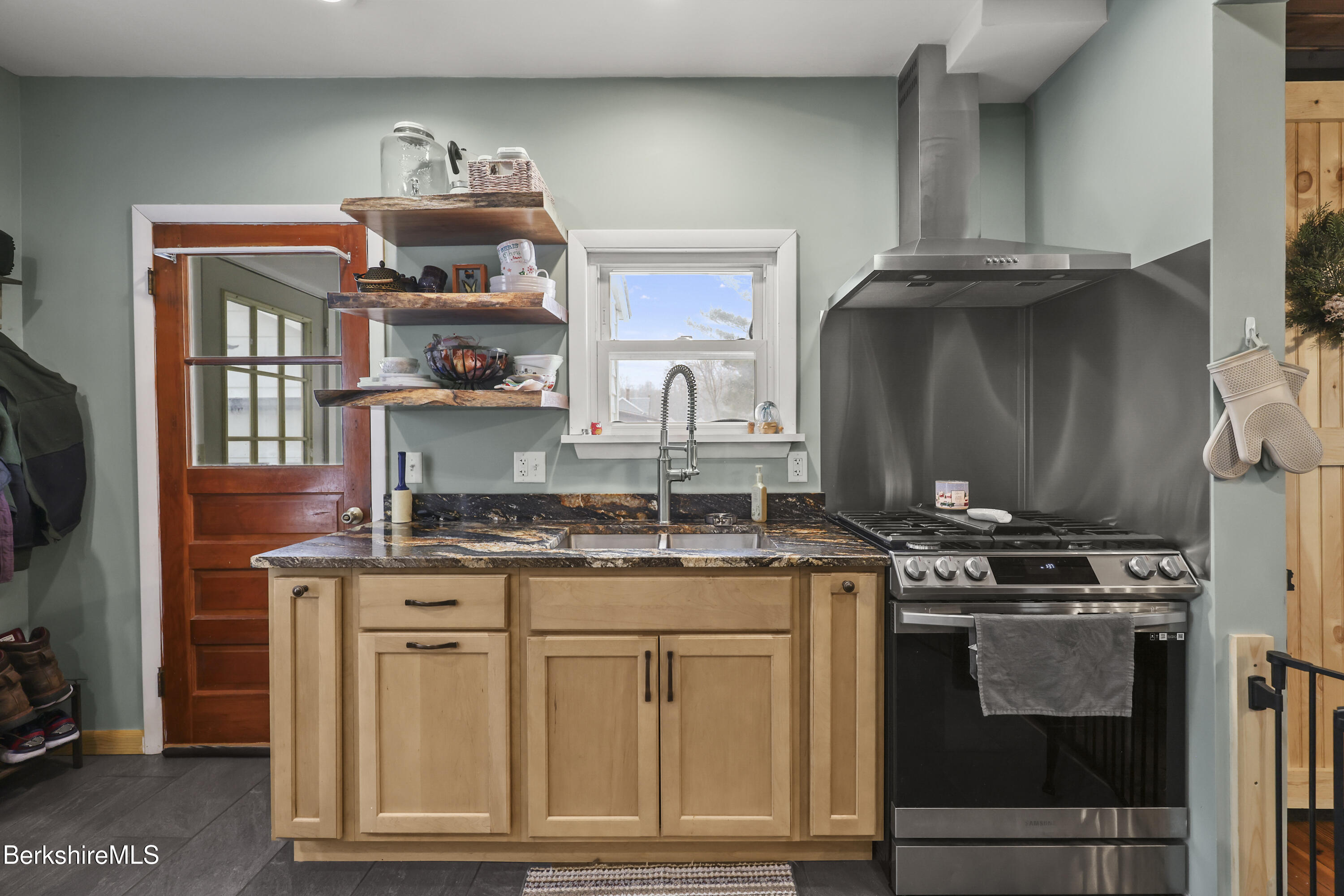 2 Crotteau Street Adams, MA 01220 - Photo 13 of 24 a kitchen with stainless steel appliances granite countertop a stove and a cabinets