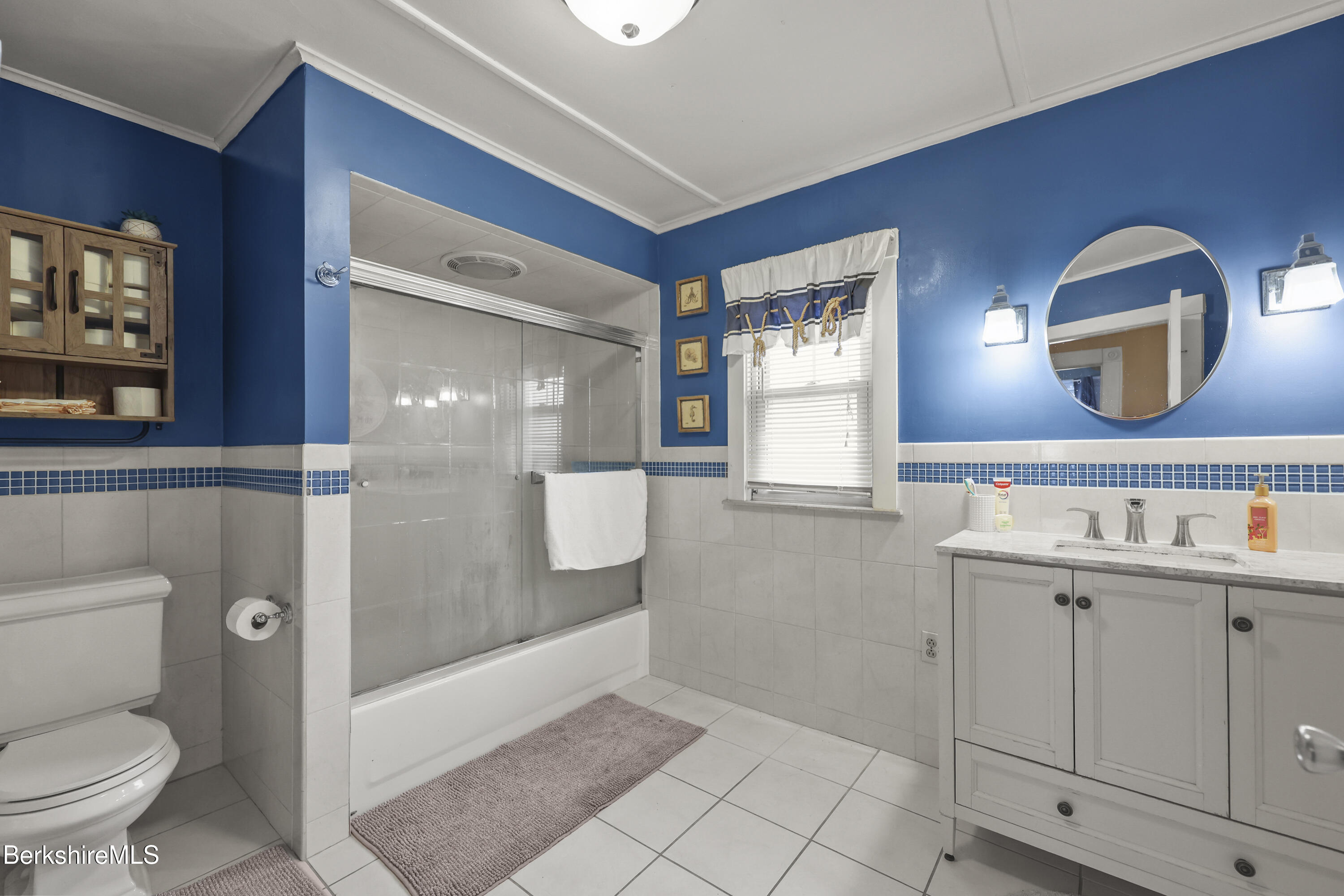 2 Crotteau Street Adams, MA 01220 - Photo 20 of 24 a bathroom with a toilet a sink and mirror