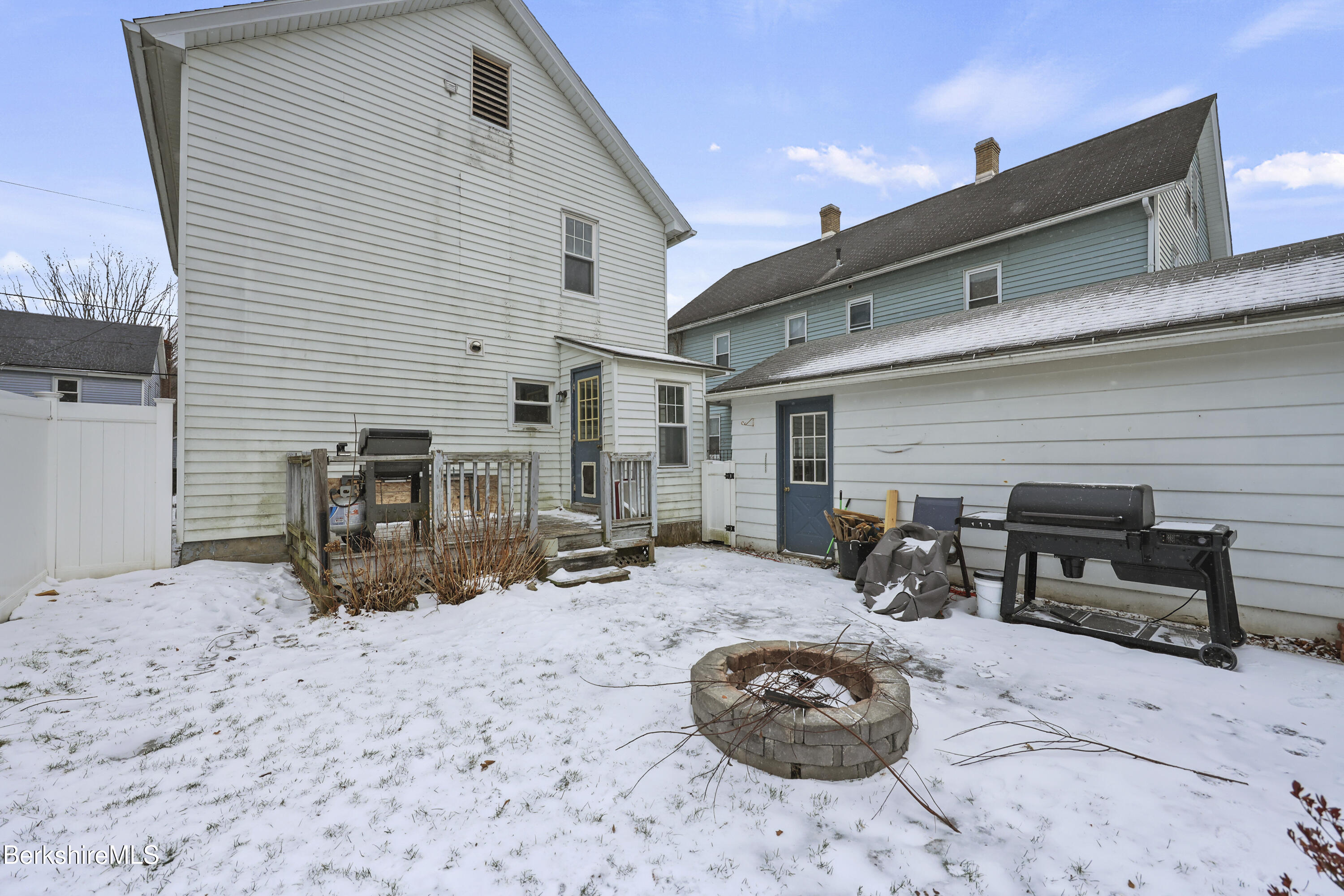 2 Crotteau Street Adams, MA 01220 - Photo 21 of 24 a view of a chairs and table in backyard