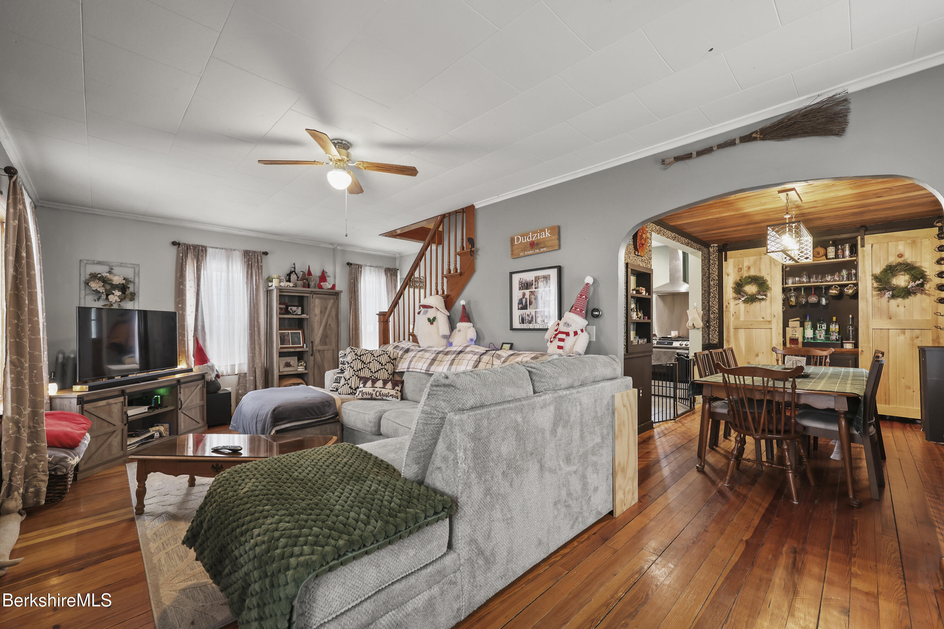 2 Crotteau Street Adams, MA 01220 - Photo 5 of 24 a living room with furniture a flat screen tv and wooden floor