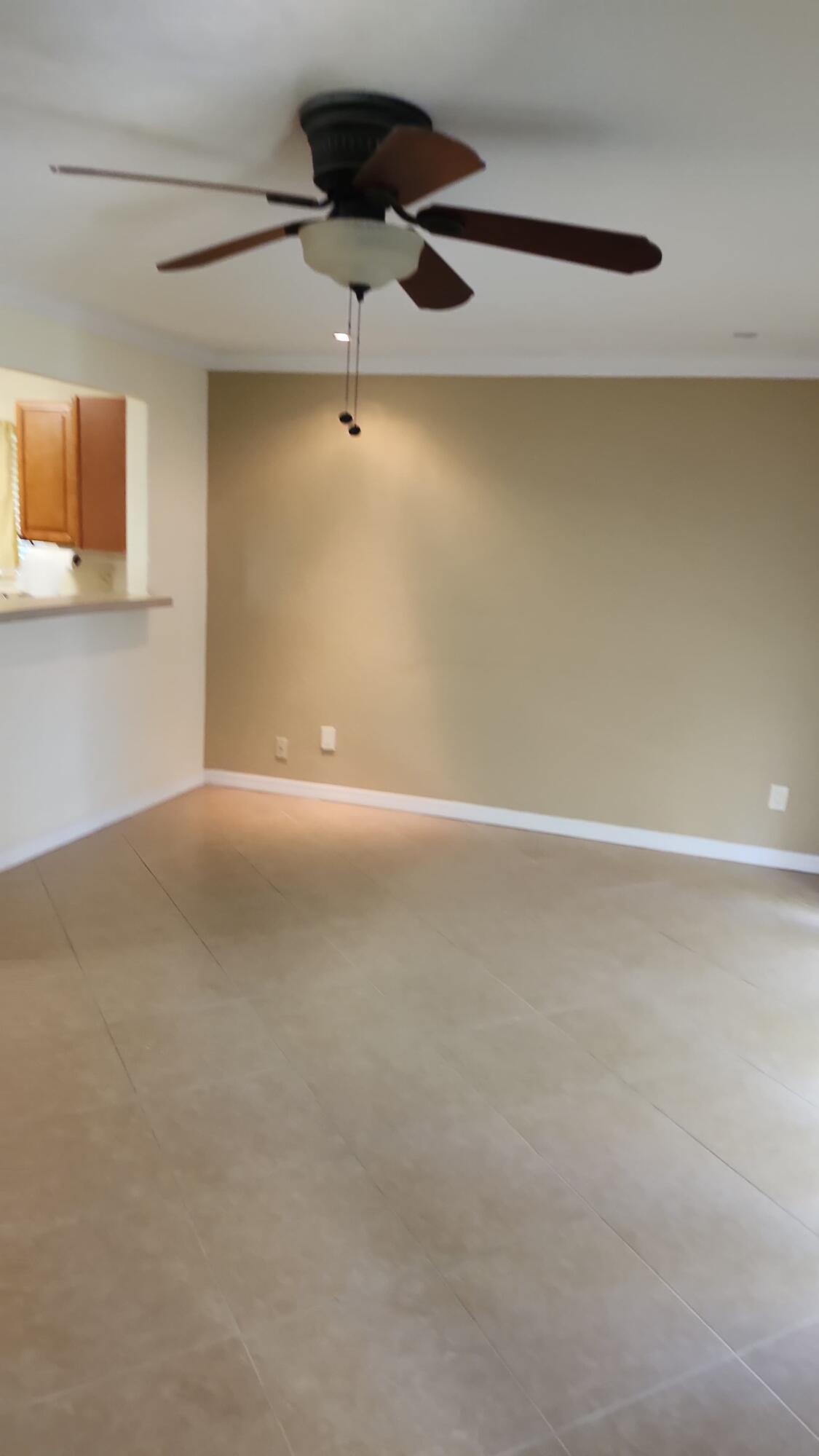 4450 Ring Neck Road, Unit 28A Orlando, FL 32808 - Photo 3 of 7 Living Room
