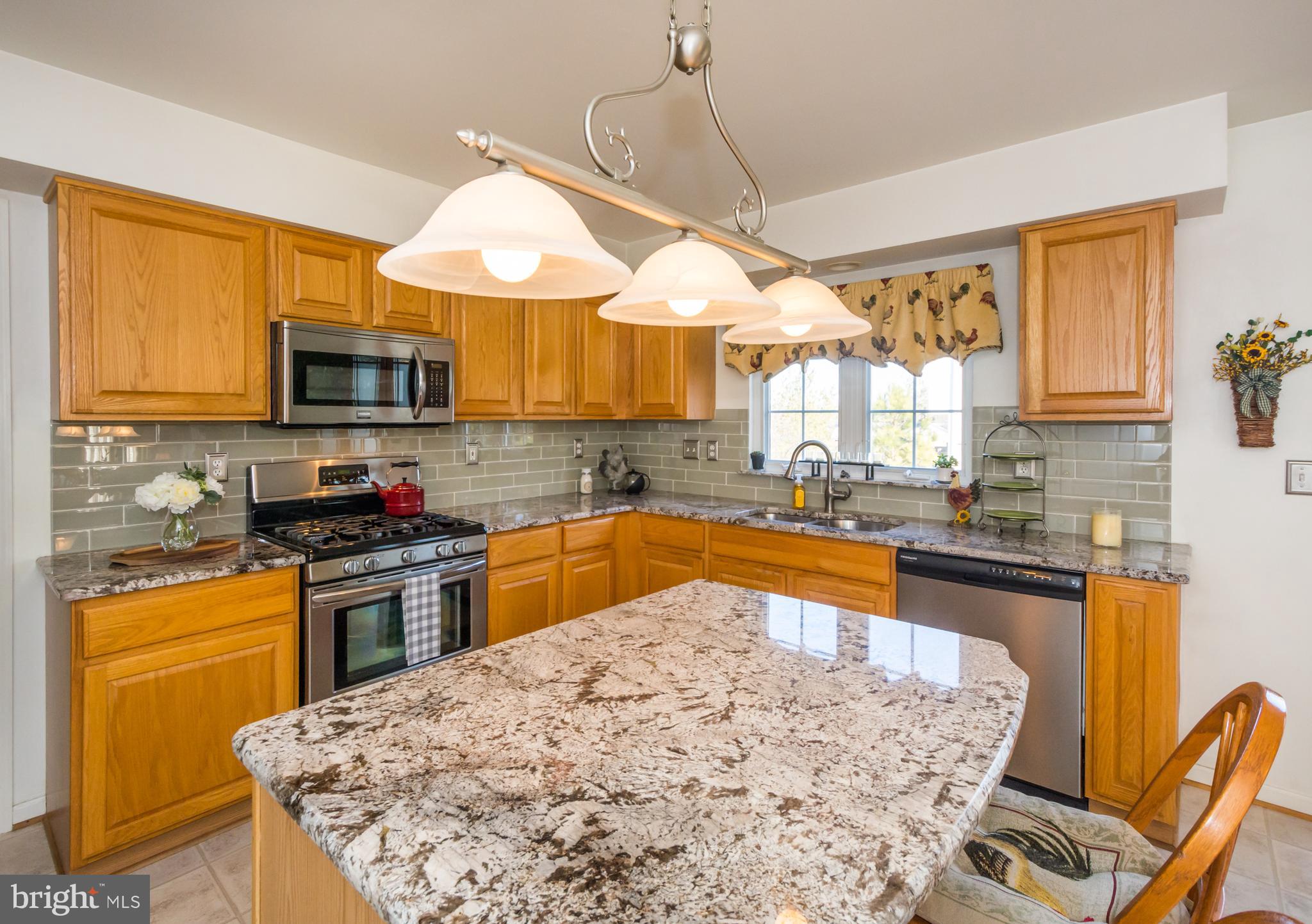 8100 Alan Tree Road Baltimore, MD 21237 - Photo 23 of 70 Roomy kitchen with island.
