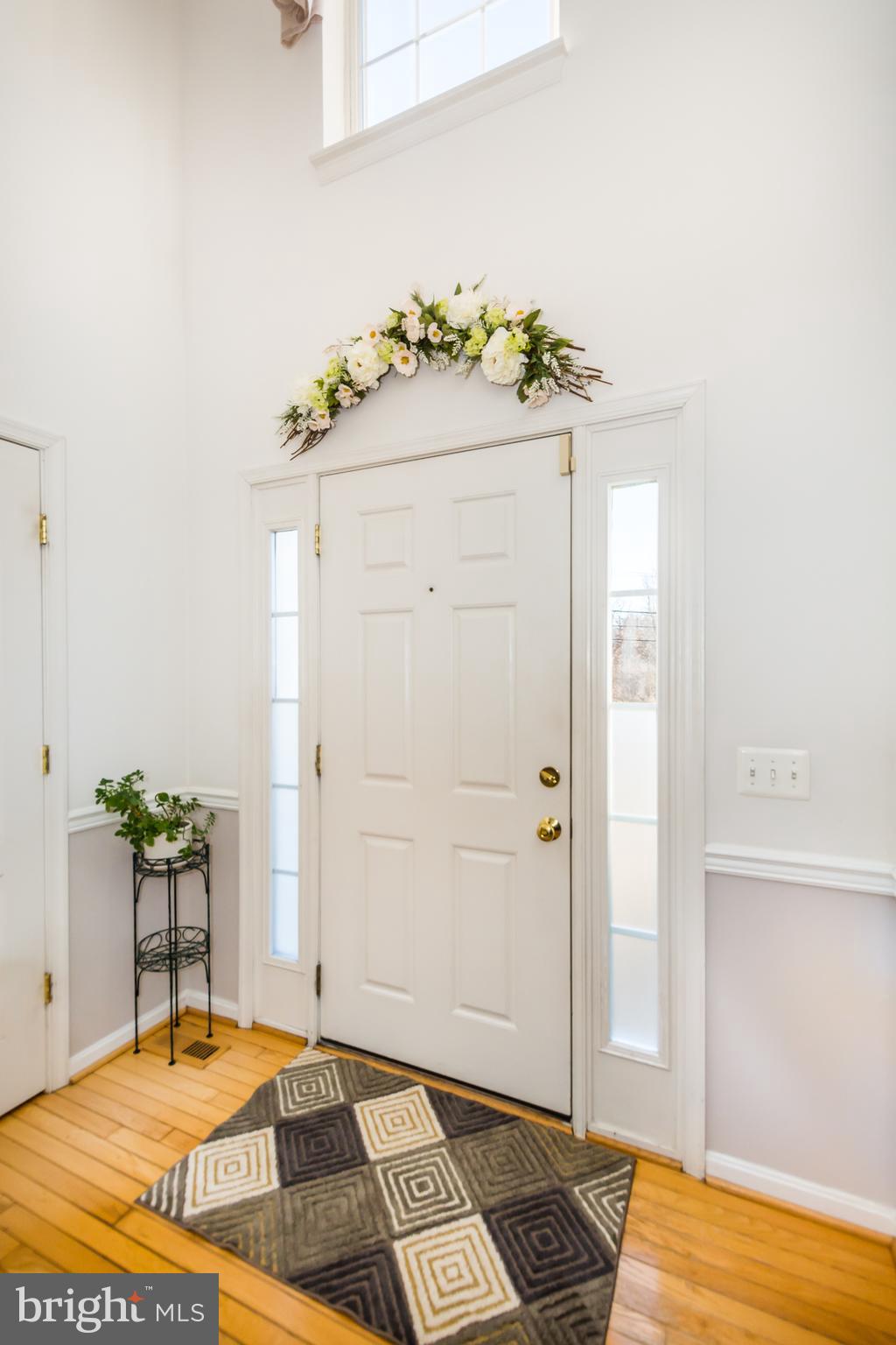 8100 Alan Tree Road Baltimore, MD 21237 - Photo 9 of 70 Open foyer with beautiful wood floor.