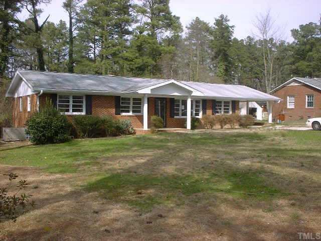 3705 Hester Circle Raleigh, NC 27604 - Photo 1 of 1 a front view of a house with a garden