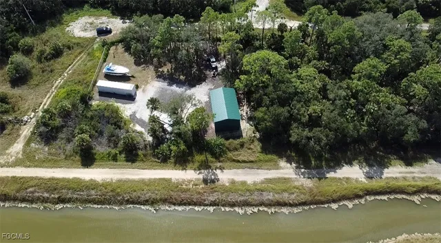 a view of swimming pool with a yard