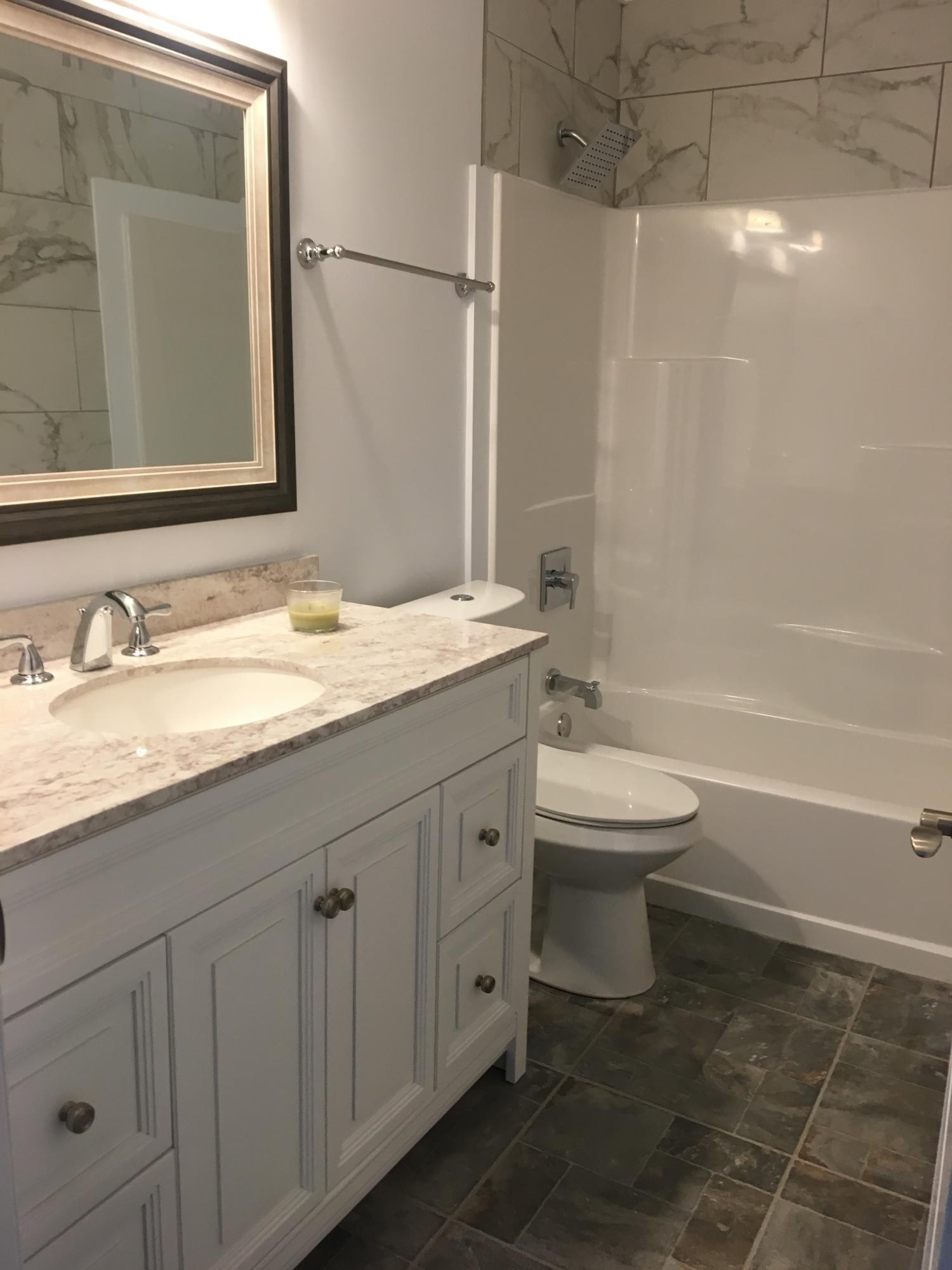 107 Pembroke Road Oak Ridge, TN 37830 - Photo 11 of 28 a bathroom with a granite countertop sink toilet and a mirror