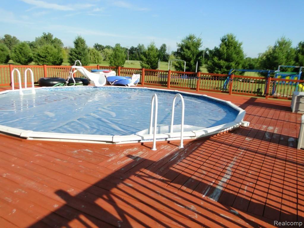 2570 Daley Road Lapeer, MI 48446 - Photo 41 of 47 Large Deck and Pool
