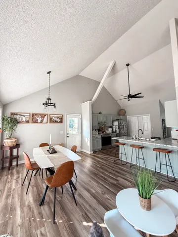 a view of a dining room with furniture