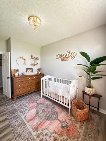 a bathroom with a sink and mirror with toilet
