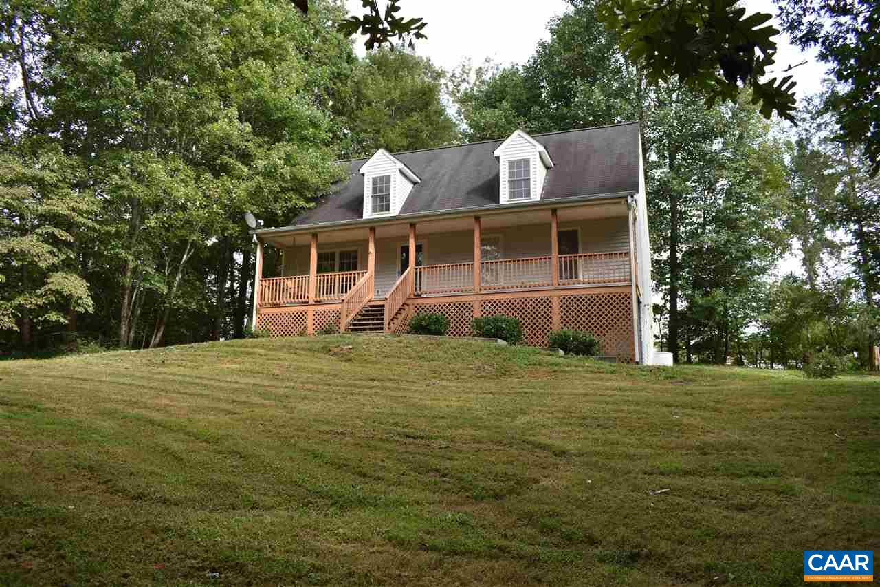 334 East Daffodil Road Ruckersville, VA 22968 - Photo 1 of 50 a front view of a house with a garden