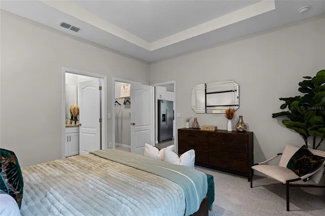 a bedroom with a bed and furniture