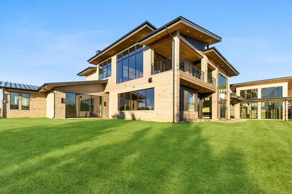an aerial view of a house with a garden