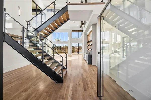 a view of entryway with wooden floor