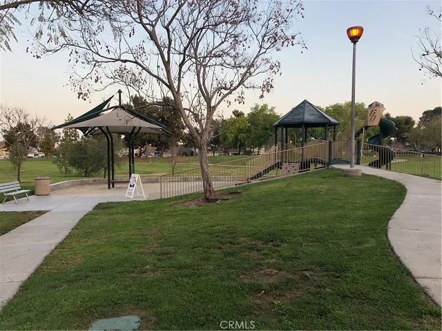 a view of a park with swings