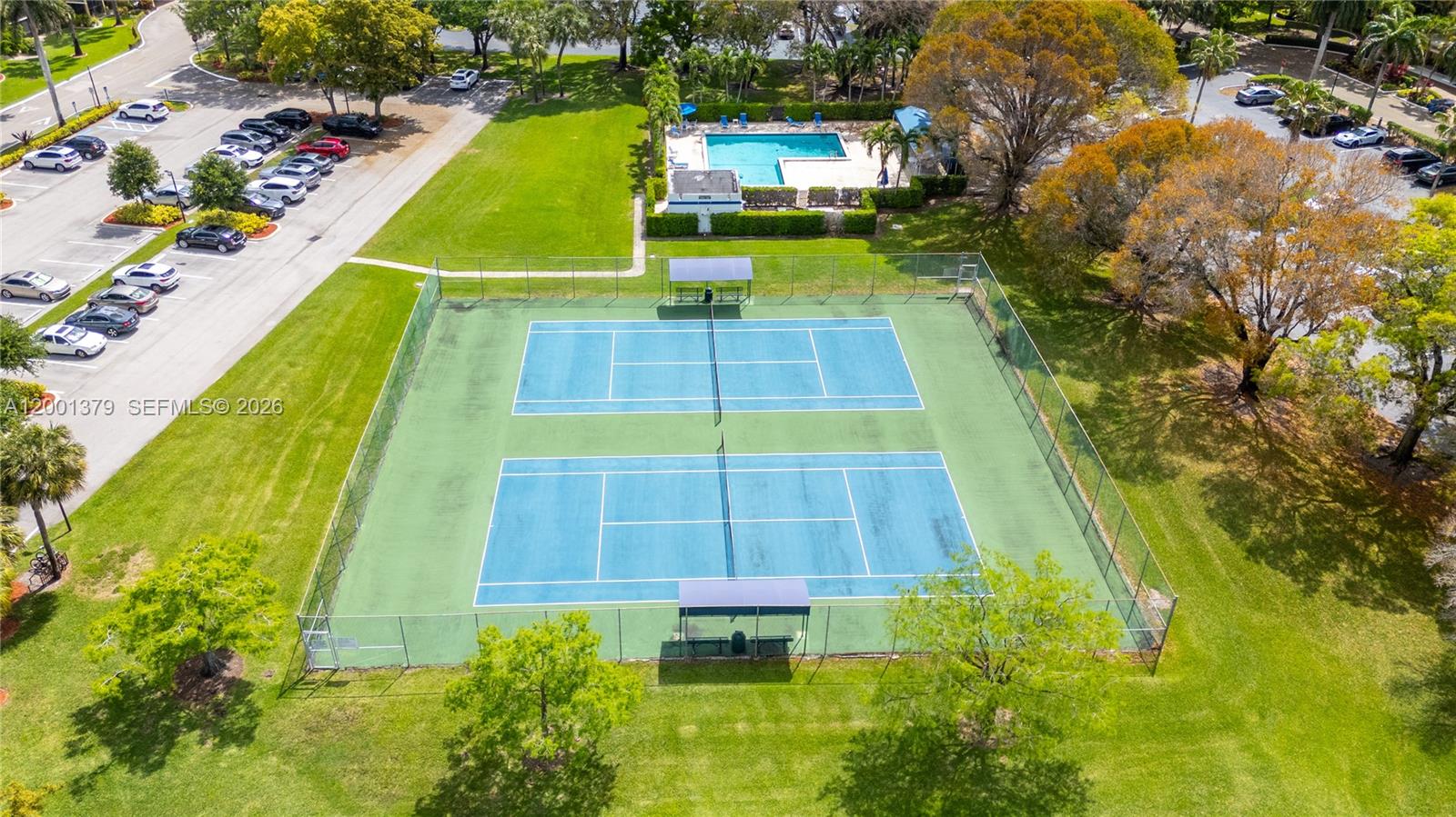 16251 Golf Club Road, Unit 311 Weston, FL 33326 - Photo 32 of 38 a view of a swimming pool