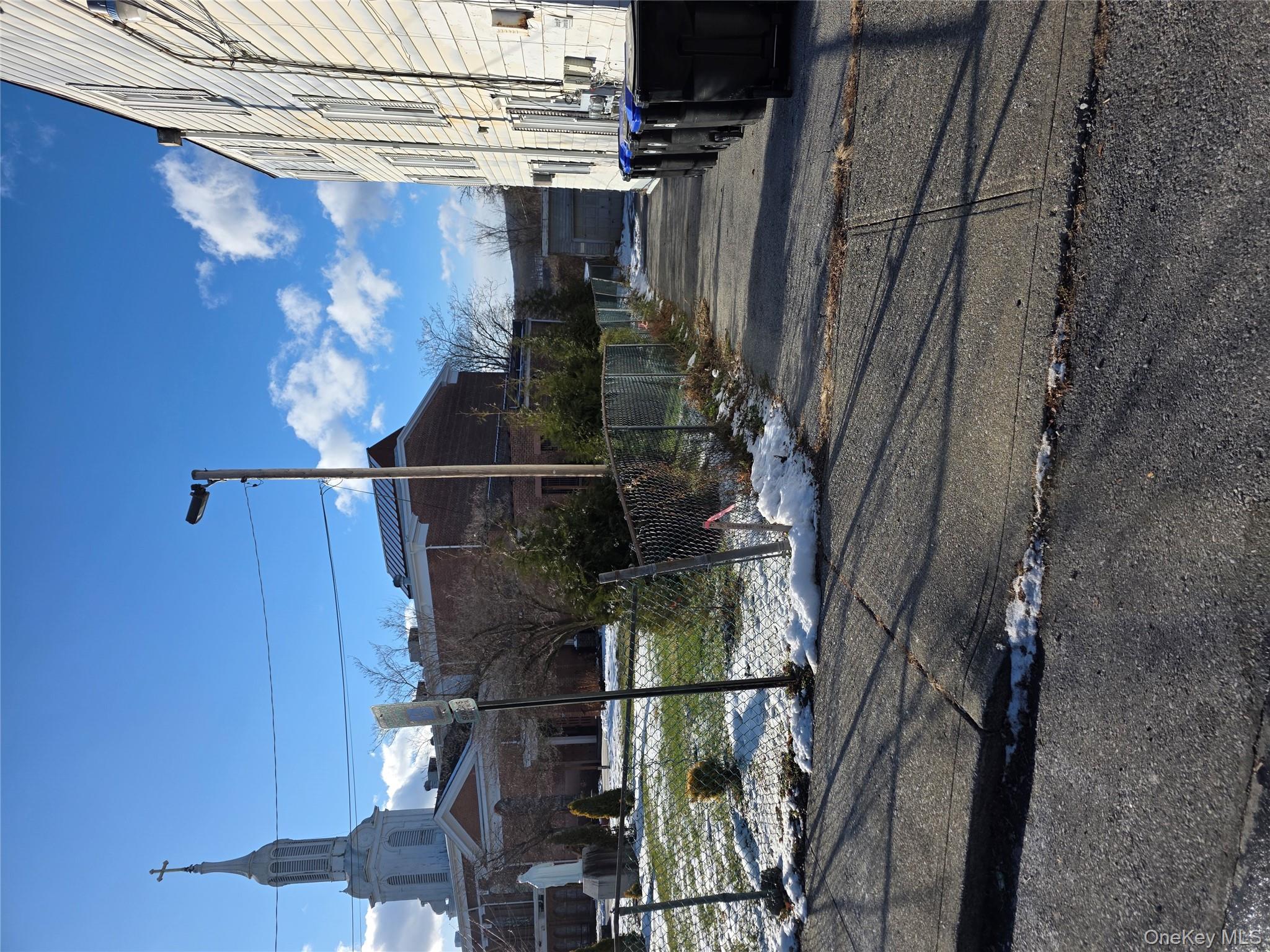 18 Davis Street Poughkeepsie, NY 12601 - Photo 14 of 14 View of asphalt road with street lights