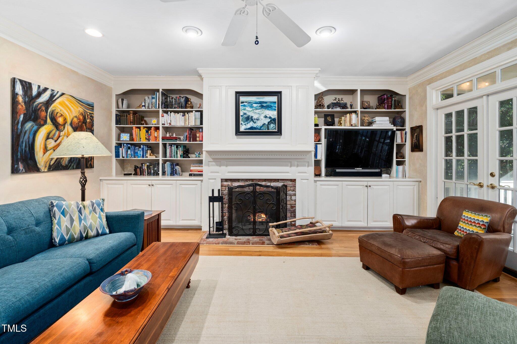 1408 Dogwood Lane Raleigh, NC 27607 - Photo 20 of 48 Beautiful built-in bookcases and wood burning fireplace (with gas hook up!)