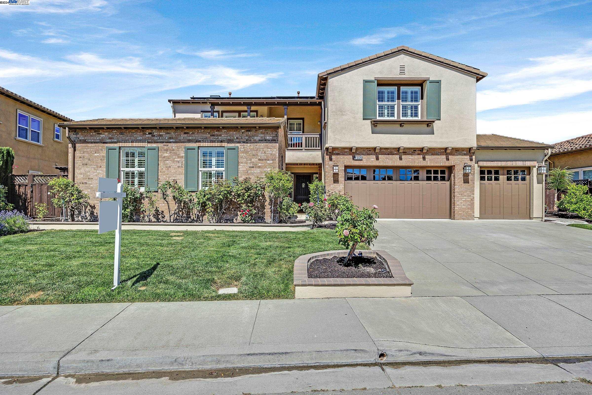 a front view of house with yard