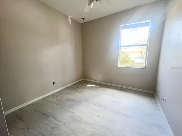 an empty room with a window