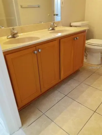 a bathroom with a sink and a toilet