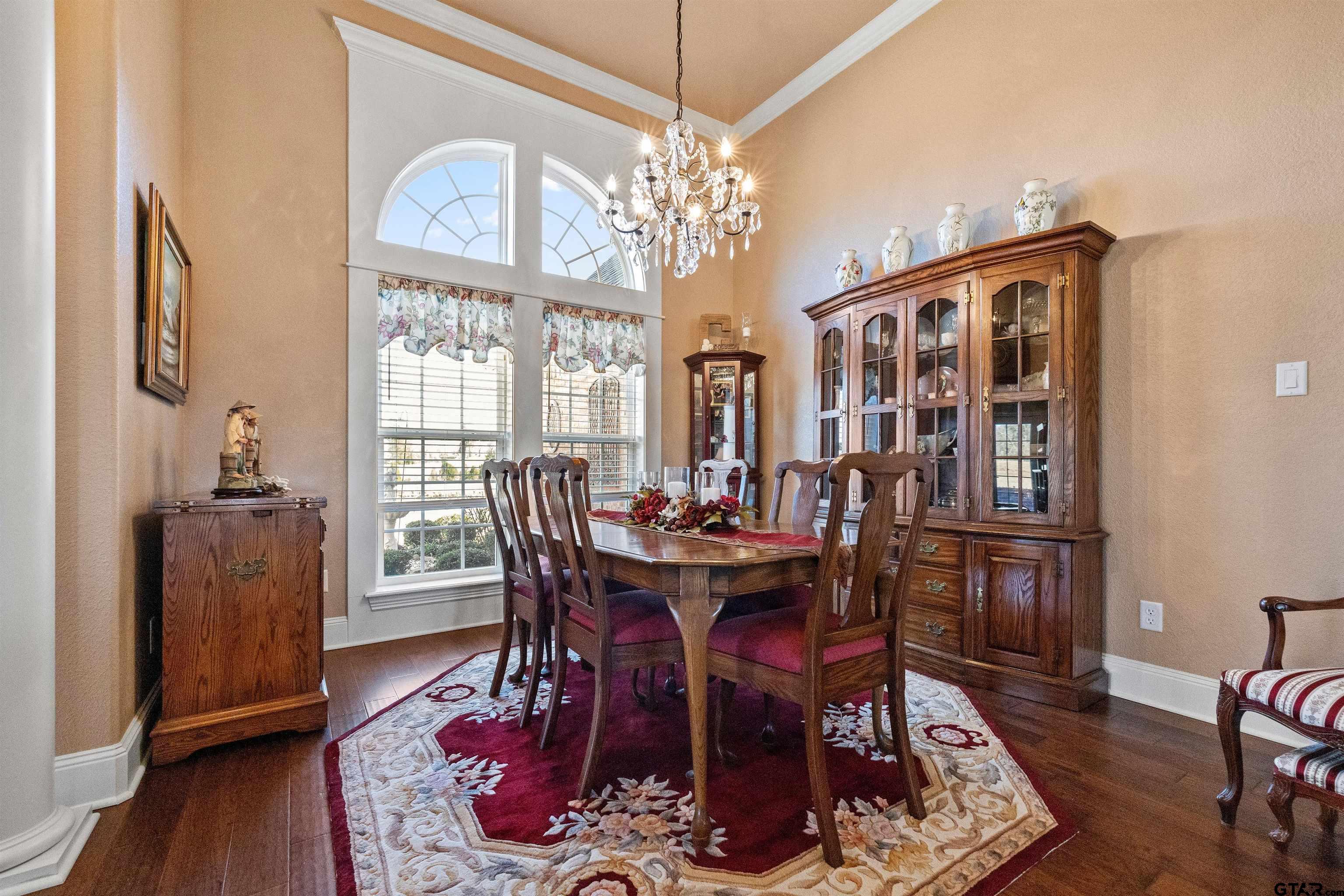 8499 Fm 856 Street Troup, TX 75789 - Photo 11 of 47 a view of a dining room with furniture window and wooden floor