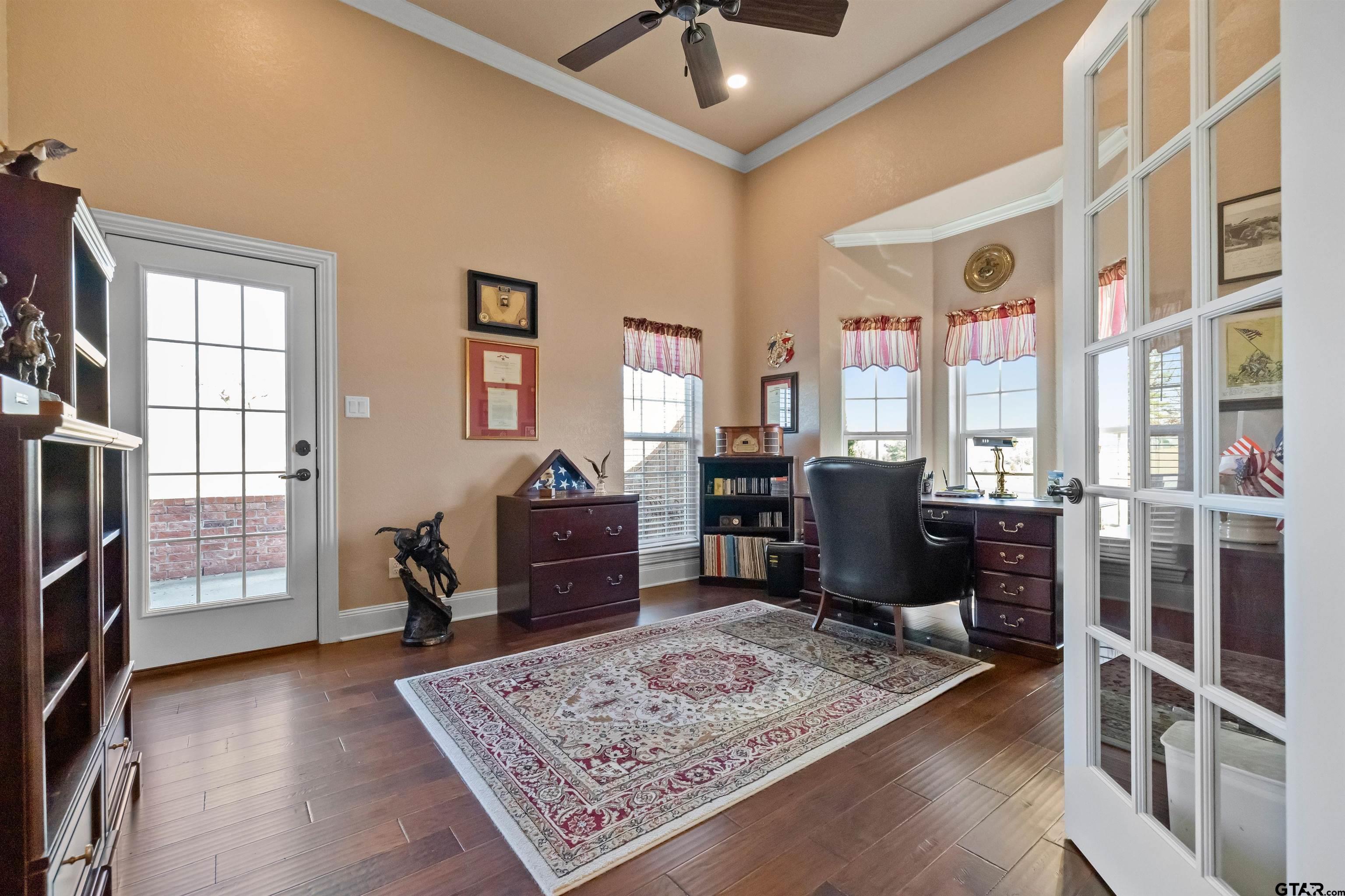 8499 Fm 856 Street Troup, TX 75789 - Photo 21 of 47 a living room with furniture rug and wooden floor