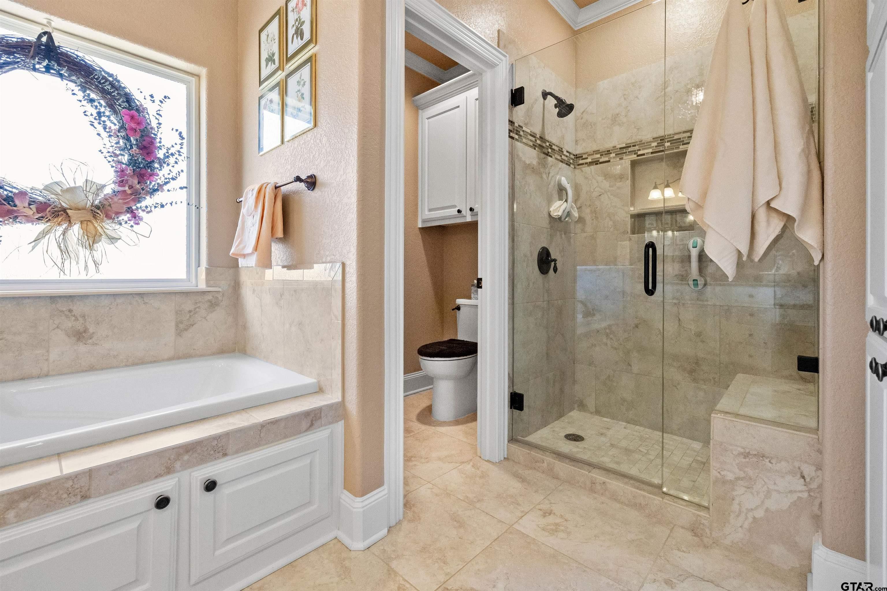 8499 Fm 856 Street Troup, TX 75789 - Photo 25 of 47 a bathroom with a shower and a sink