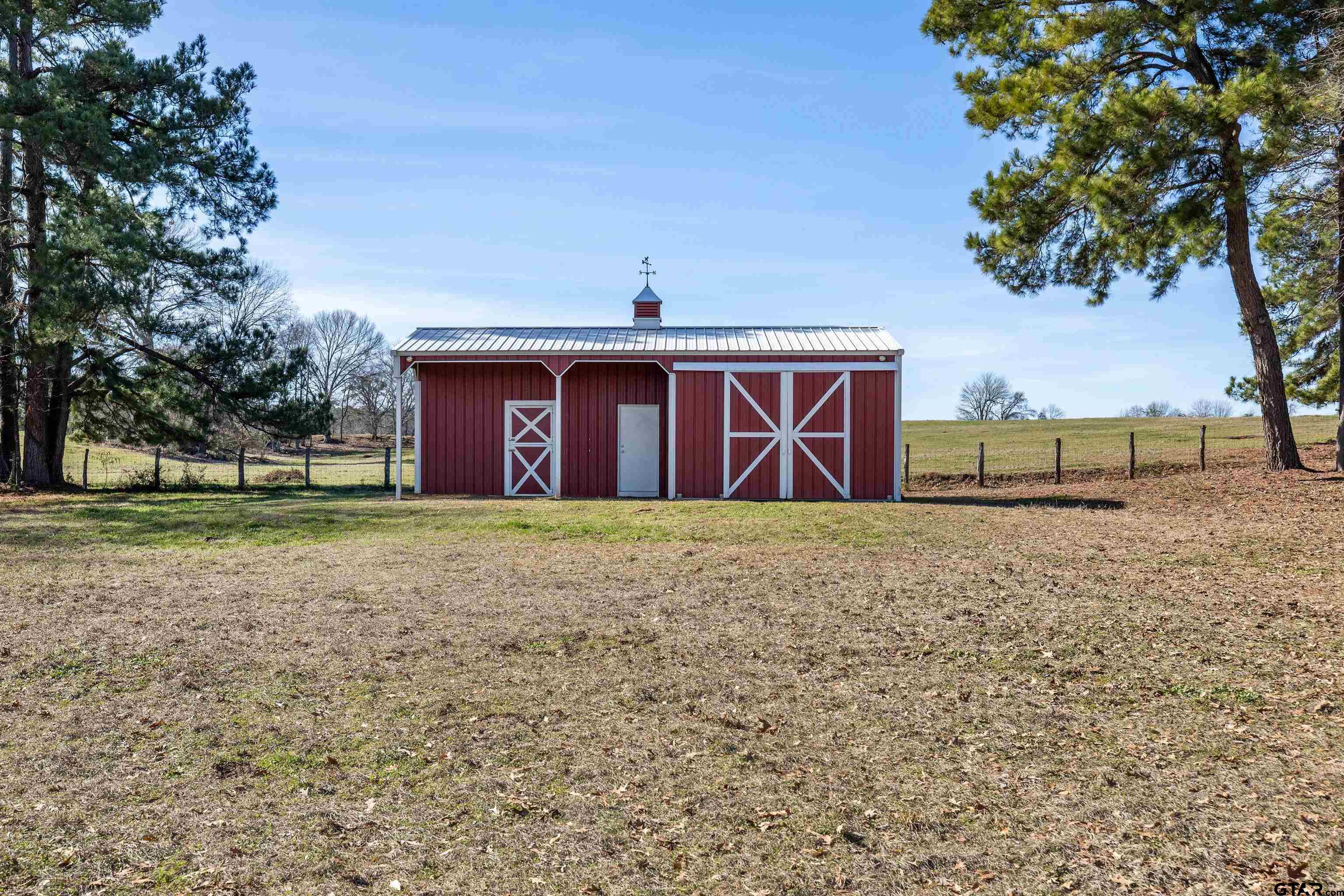 8499 Fm 856 Street Troup, TX 75789 - Photo 33 of 47 a front view of house with yard