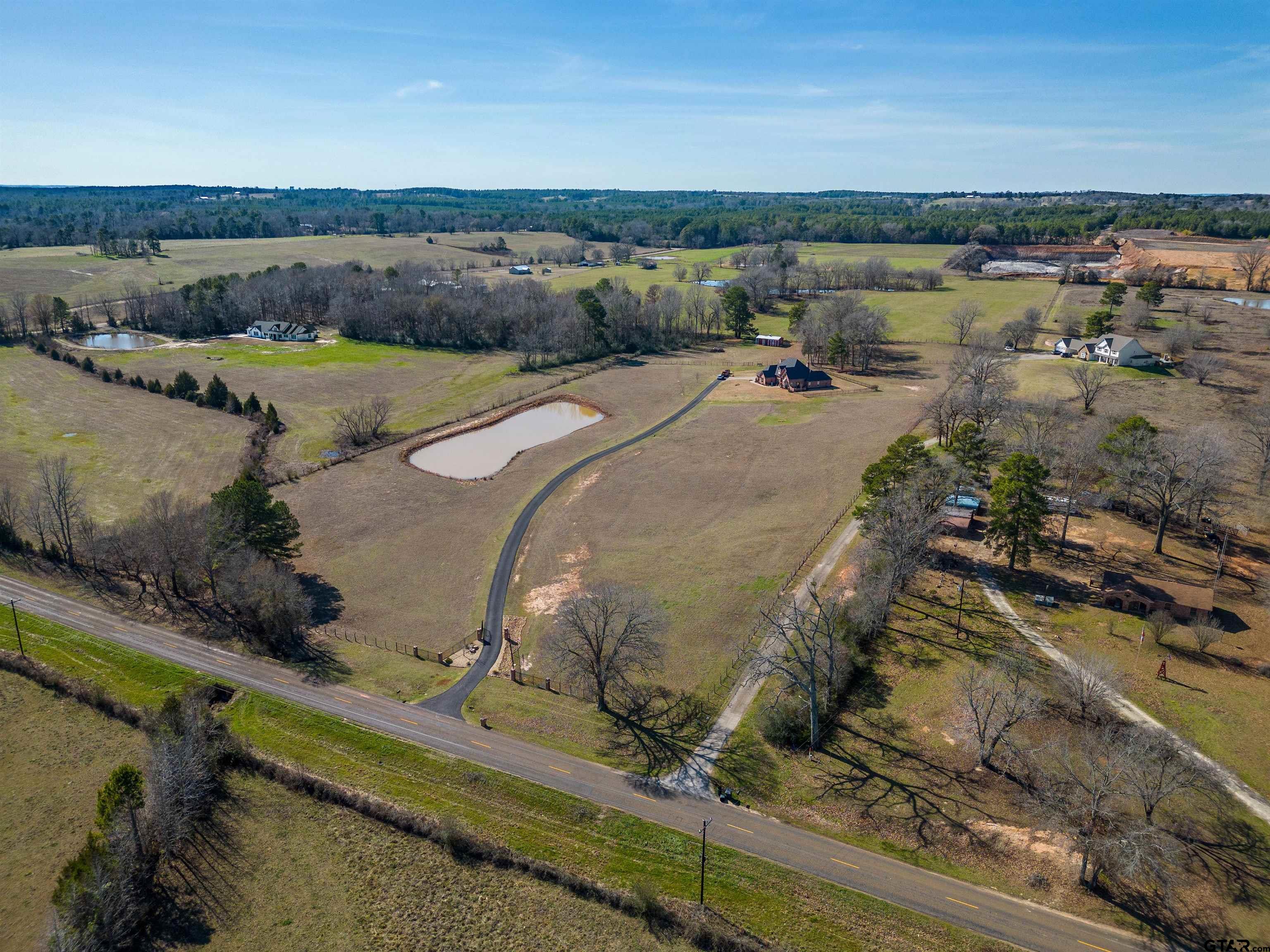 8499 Fm 856 Street Troup, TX 75789 - Photo 39 of 47 an aerial view of a house with a yard