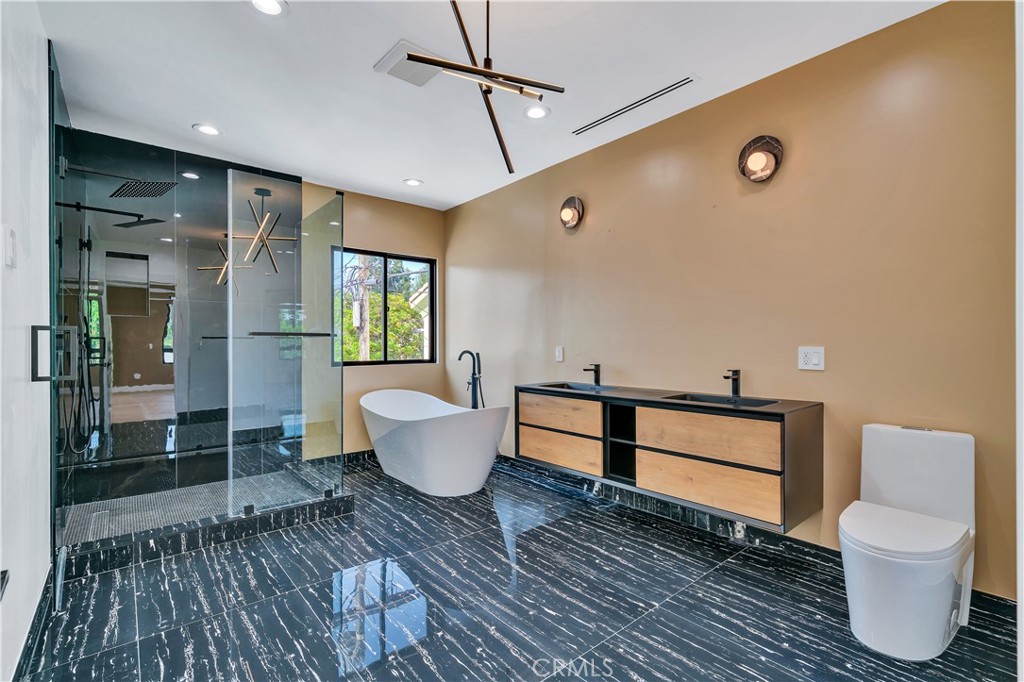 13838 Milbank Street Sherman Oaks, CA 91423 - Photo 20 of 57 a living room with a couch and a table