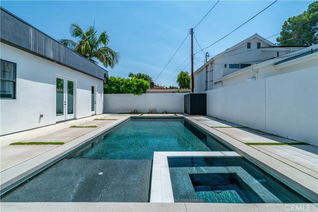 13838 Milbank Street Sherman Oaks, CA 91423 - Photo 47 of 57 a view of outdoor space and swimming pool